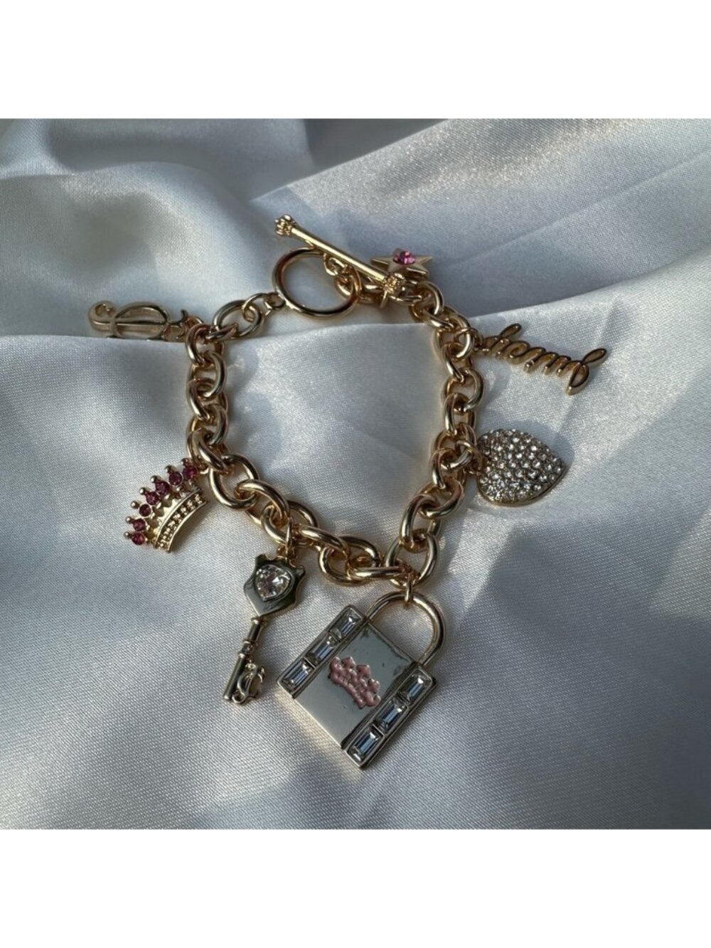 Gold Charm Bracelet with Pink Accents